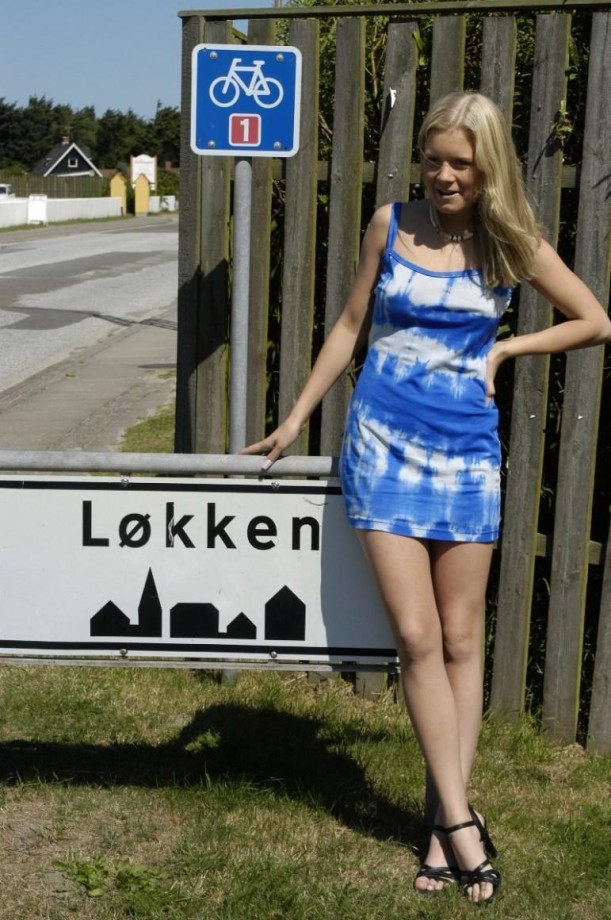 Swedish blond teen having fun on the beach