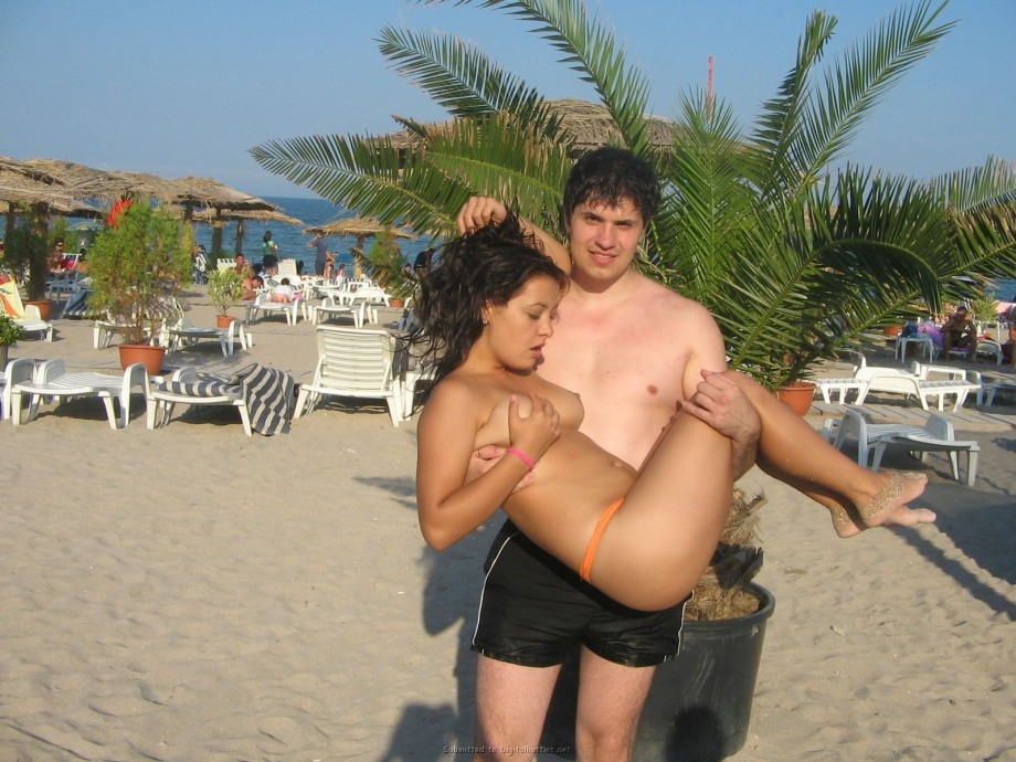 Young teen couple on the beach 