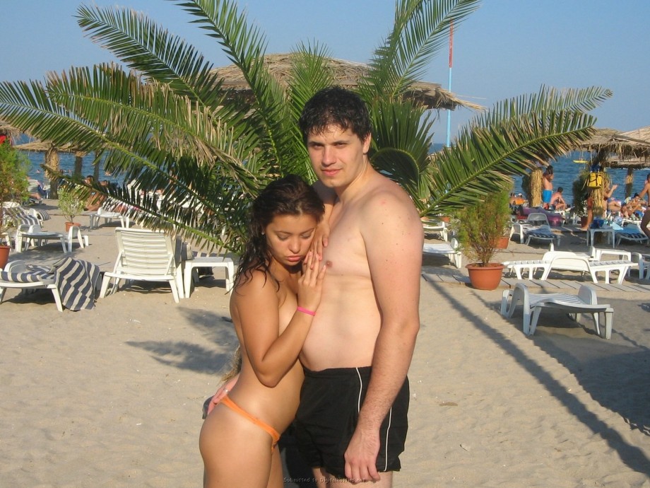 Young teen couple on the beach 