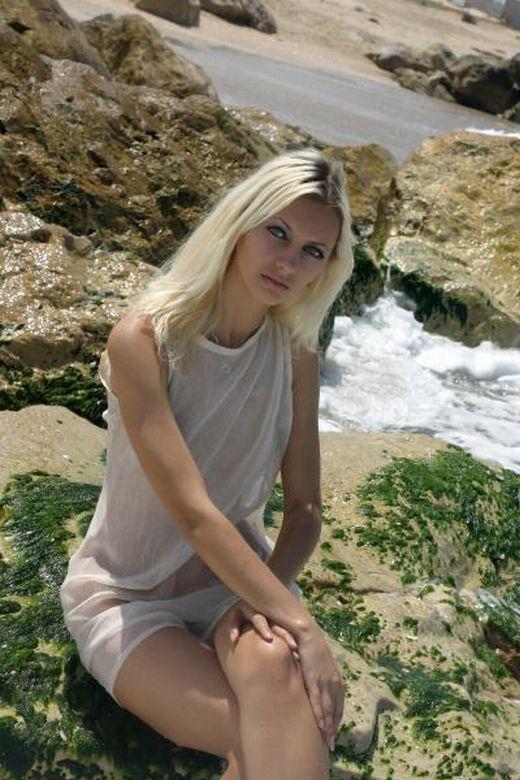 Cute blonde on nude beach 