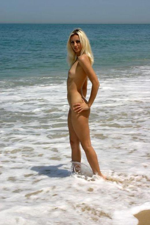 Cute blonde on nude beach 