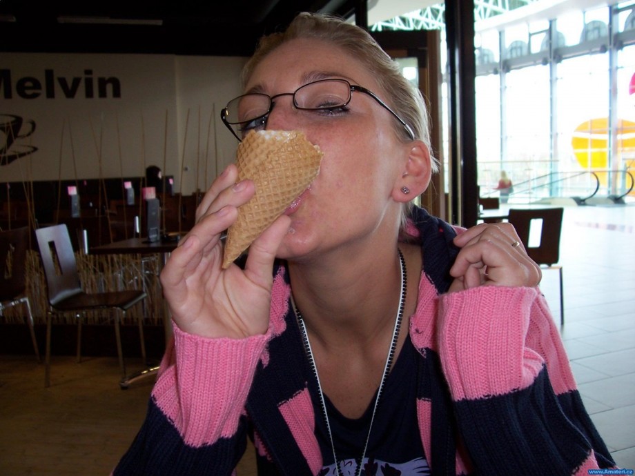 Blonde amateur with glasses posing 