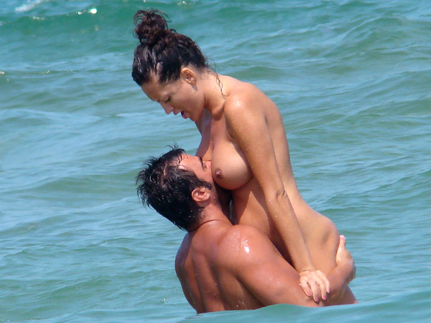 Young nudist couple at beach no.01