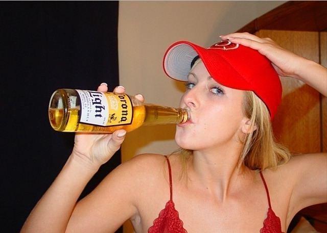 Blond girl with big boobs and corona