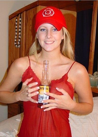 Blond girl with big boobs and corona