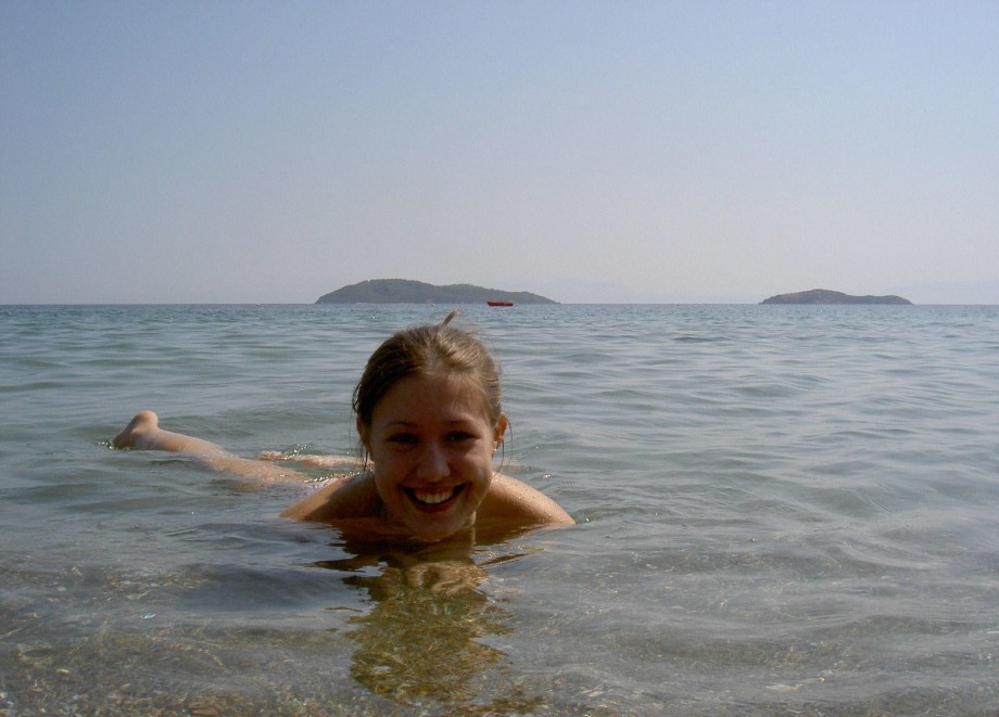 Teen blond girl on holiday  at the beach