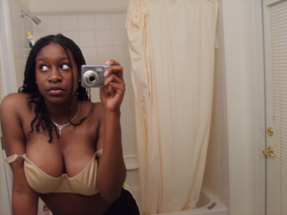 Black amateur girl and her big  tits on selfpics