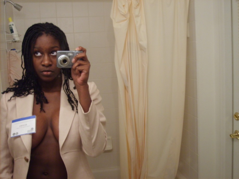 Black amateur girl and her big  tits on selfpics