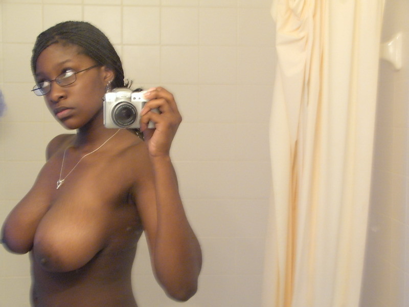 Black amateur girl and her big  tits on selfpics