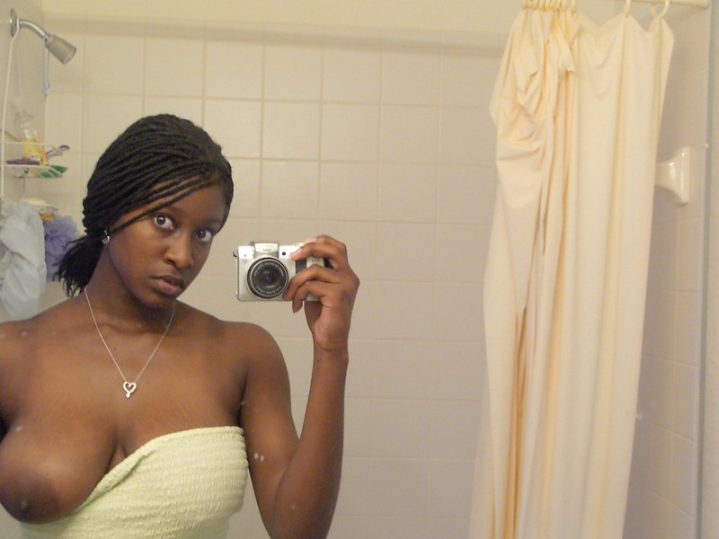 Black amateur girl and her big  tits on selfpics