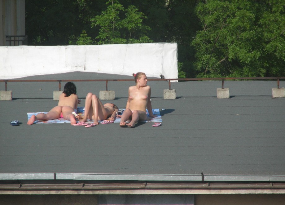 Teens sunbathing in the roof ( voyeur )