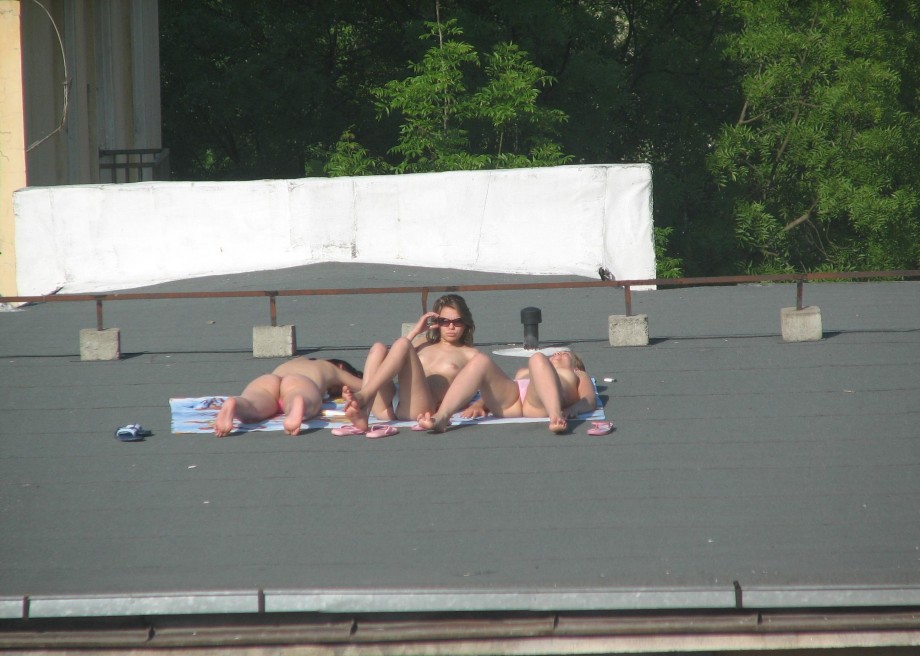 Teens sunbathing in the roof ( voyeur )