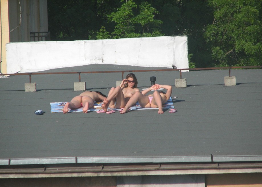 Teens sunbathing in the roof ( voyeur )