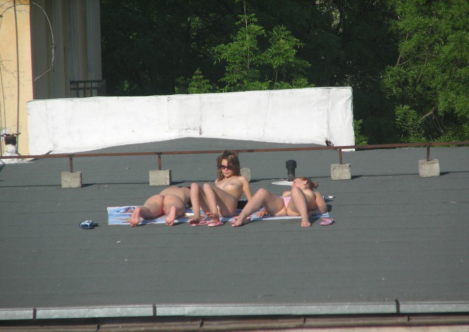 Teens sunbathing in the roof ( voyeur )