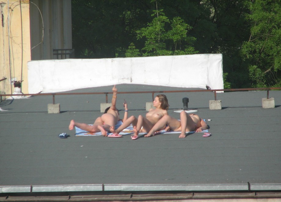 Teens sunbathing in the roof ( voyeur )