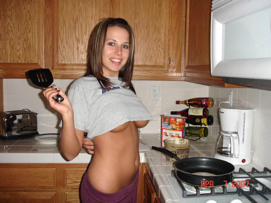 Naked amateur girls cook in the kitchen