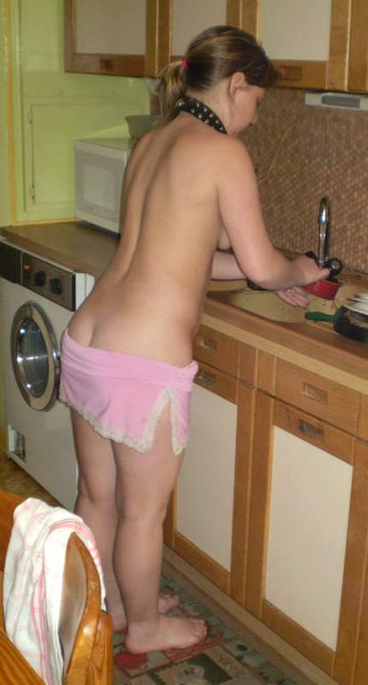 Naked amateur girls cook in the kitchen