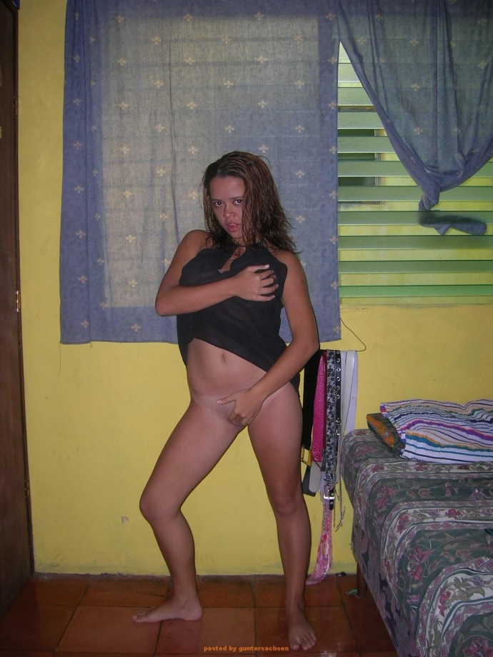 Young girlfriend possing at home