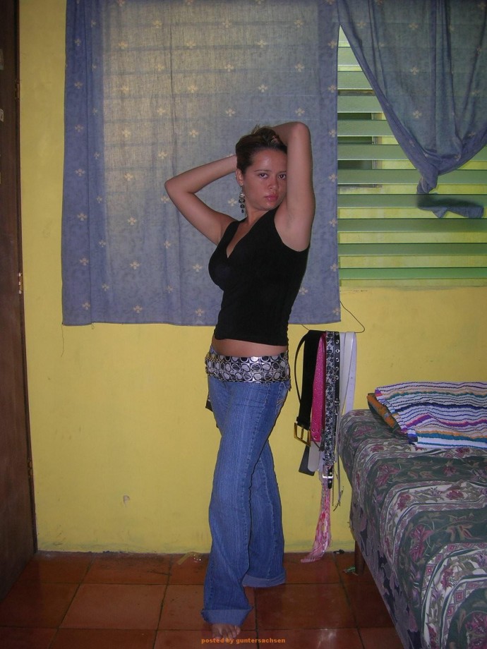 Young girlfriend possing at home