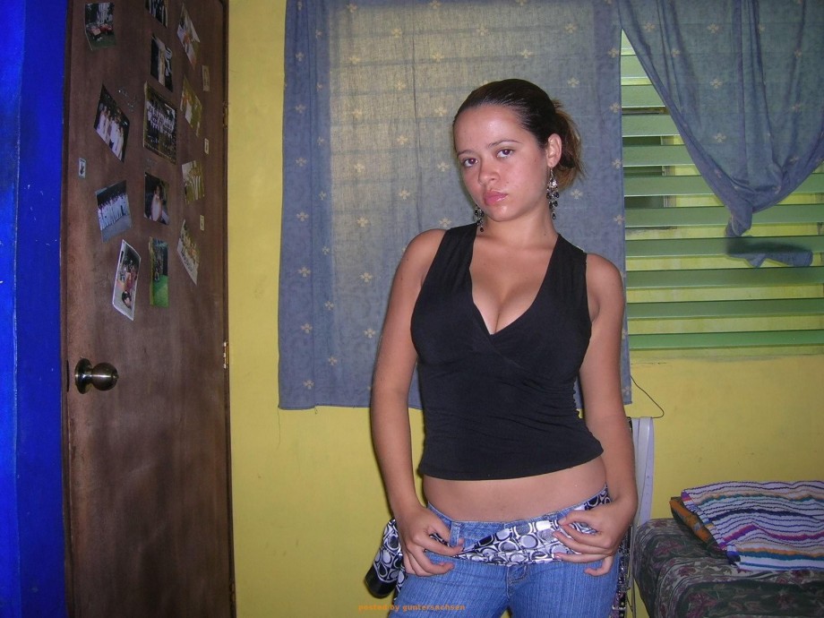 Young girlfriend possing at home