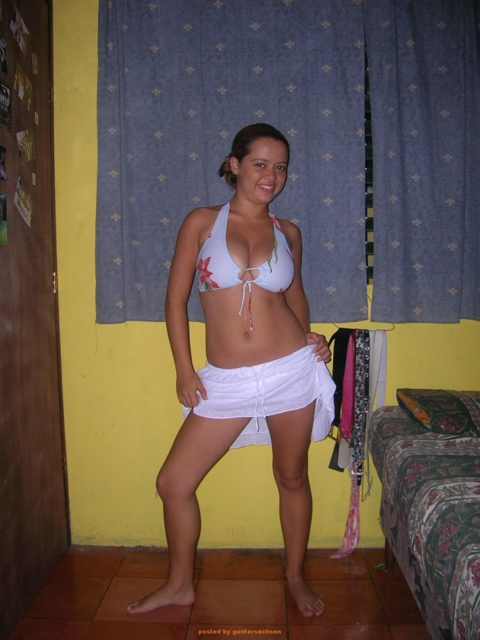 Young girlfriend possing at home