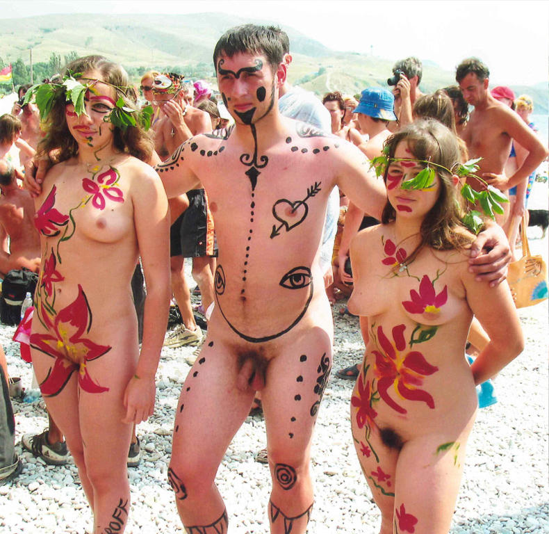 Amateur nudists and theirs beach body painting