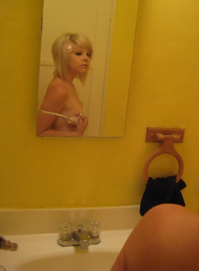 Cute blonde in bathtub 