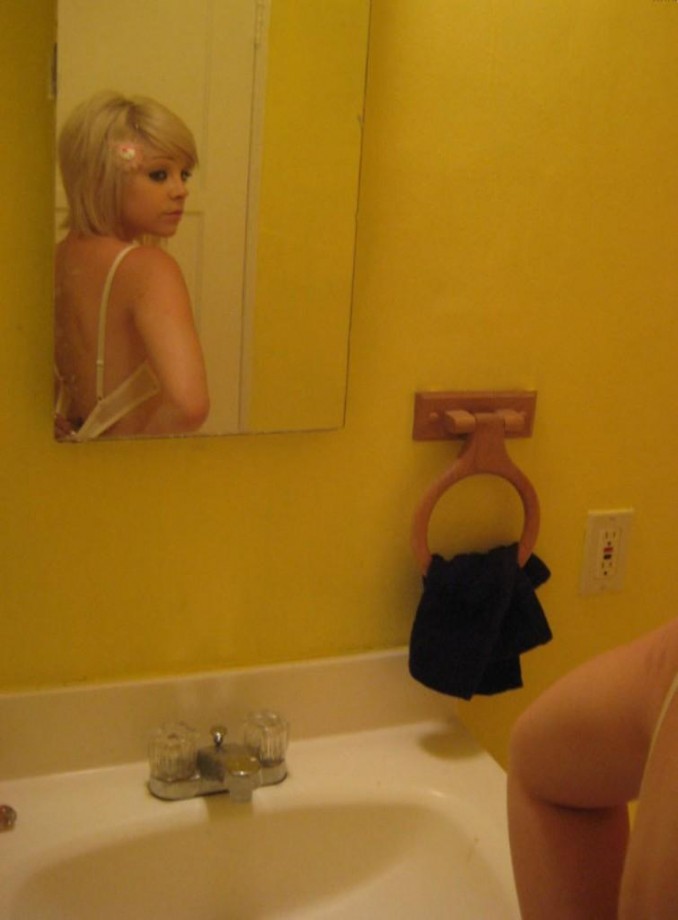 Cute blonde in bathtub 