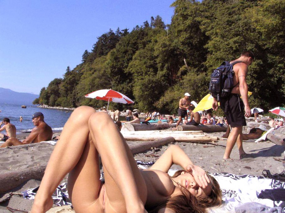 Young nudists and theirs hot summer at the water