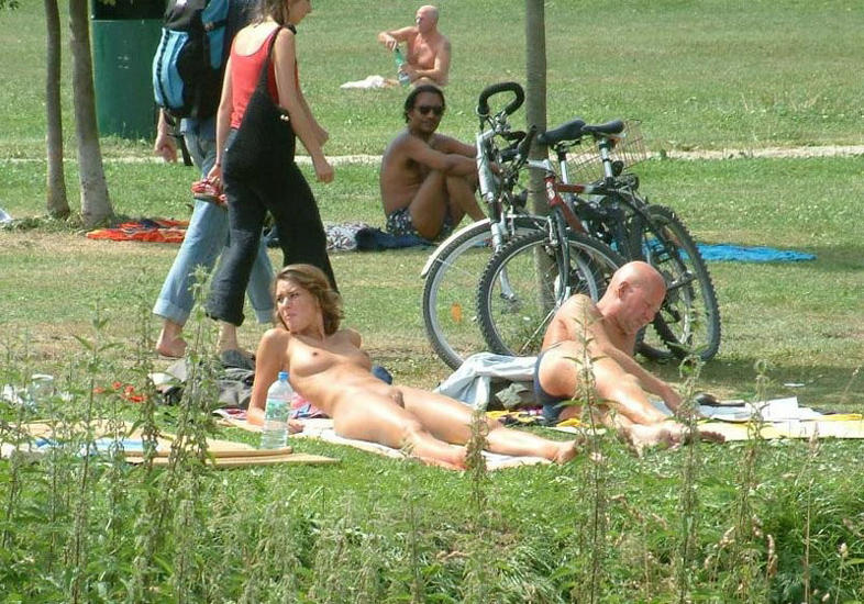 Young nudists and theirs hot summer at the water