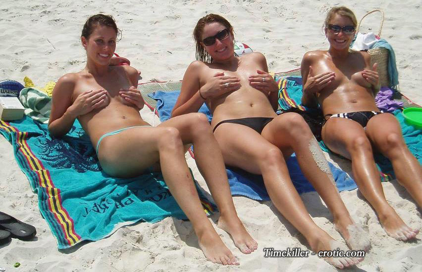 Grouptopless photos amateur girls on the beach