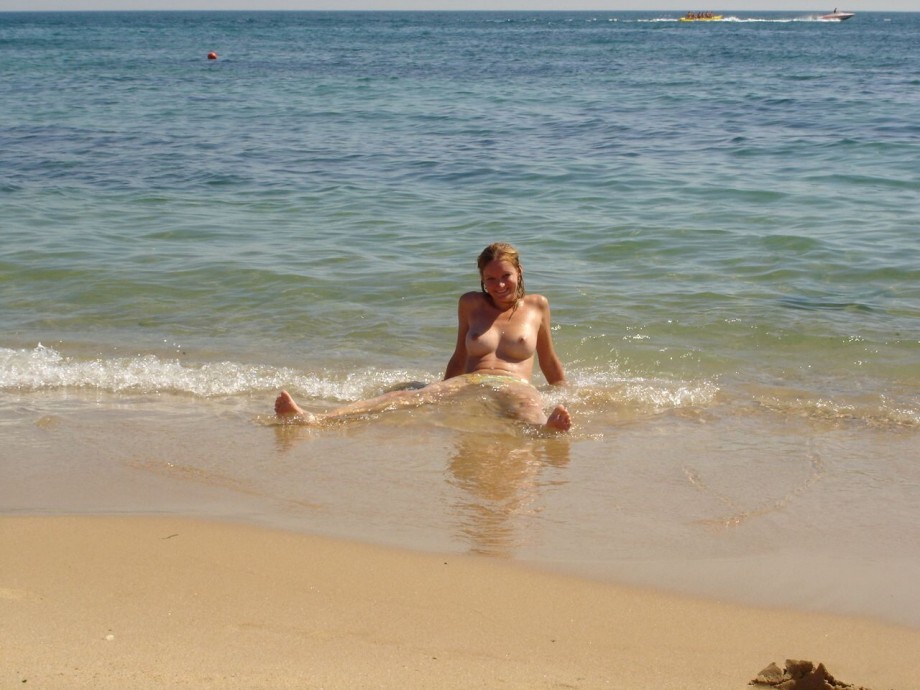 Sexy blond nude at the beach