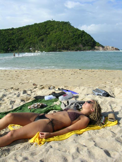 Blonde rasta-girl with boyfriend on vacation 