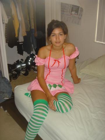 Hot girlfriend with knee-sock on the bed 