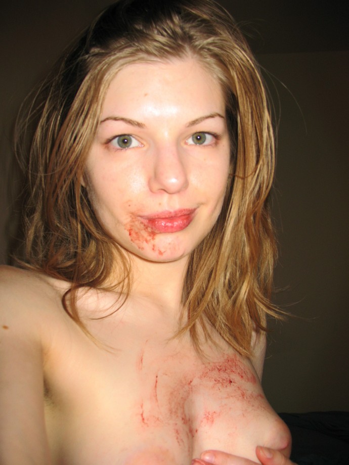 Amateur teen fingering her bloody pussy