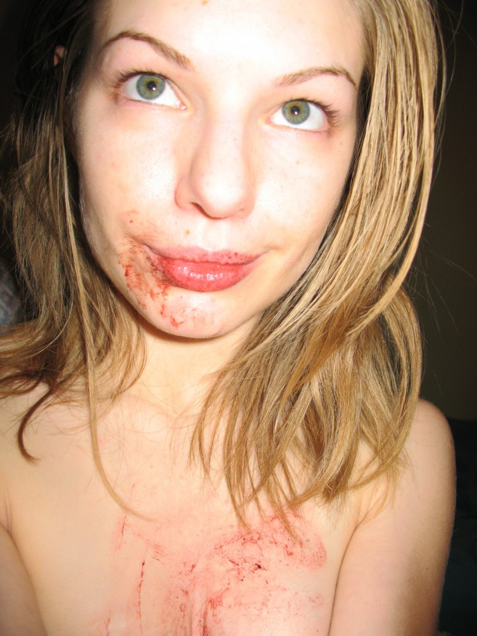 Amateur teen fingering her bloody pussy