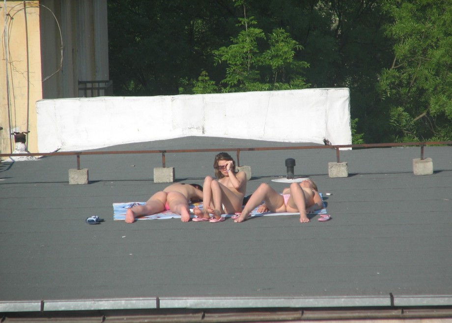 Spycam - nude girls on the roof
