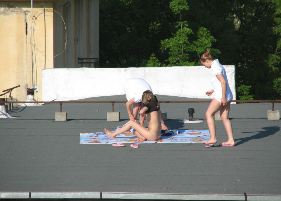 Spycam - nude girls on the roof