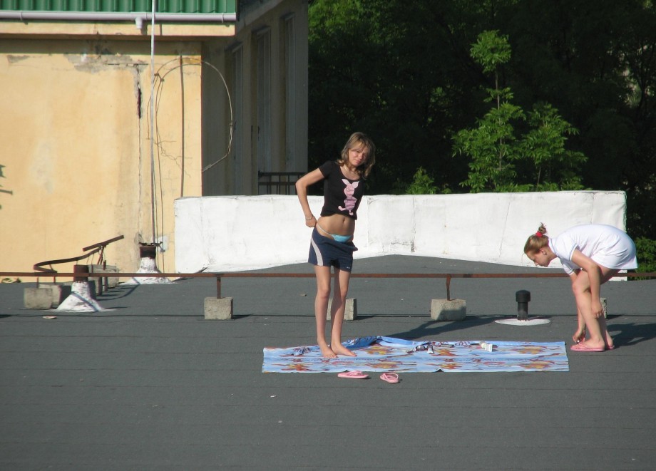 Spycam - nude girls on the roof