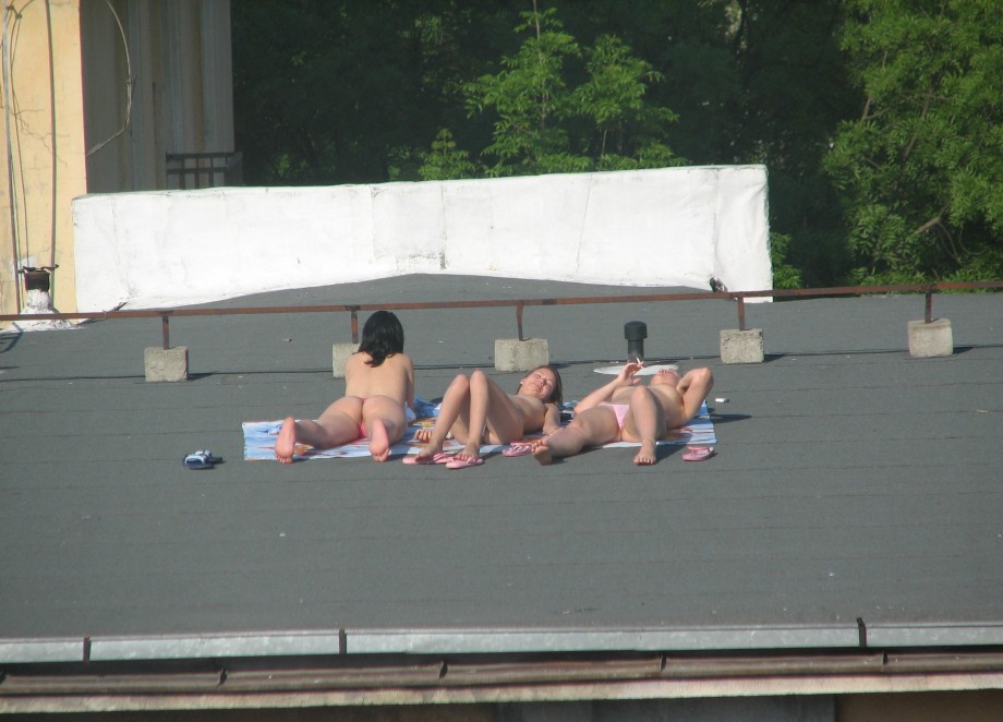 Spycam - nude girls on the roof