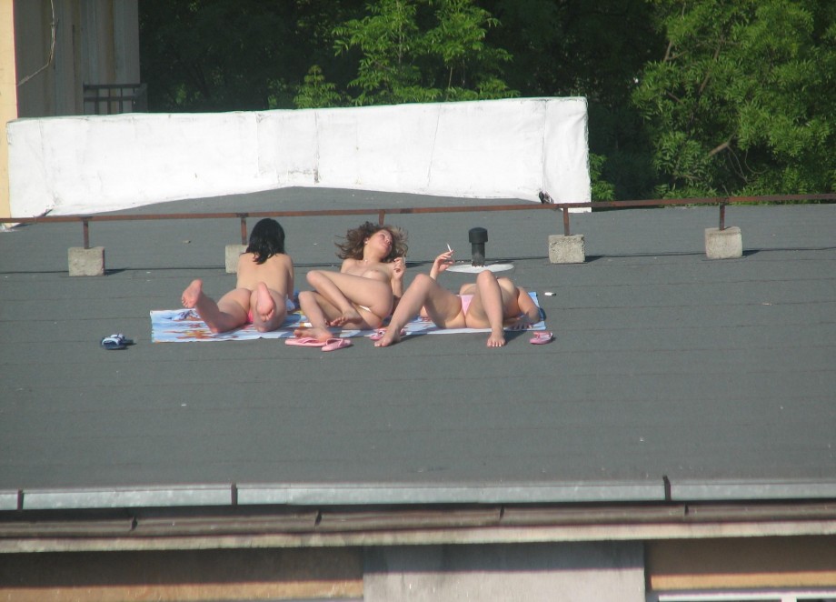 Spycam - nude girls on the roof