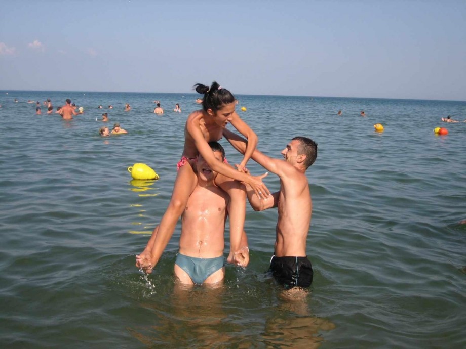 Young couples at holiday ( topless pics )