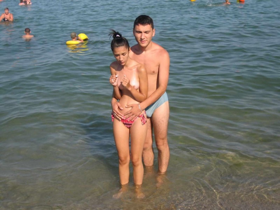 Young couples at holiday ( topless pics )