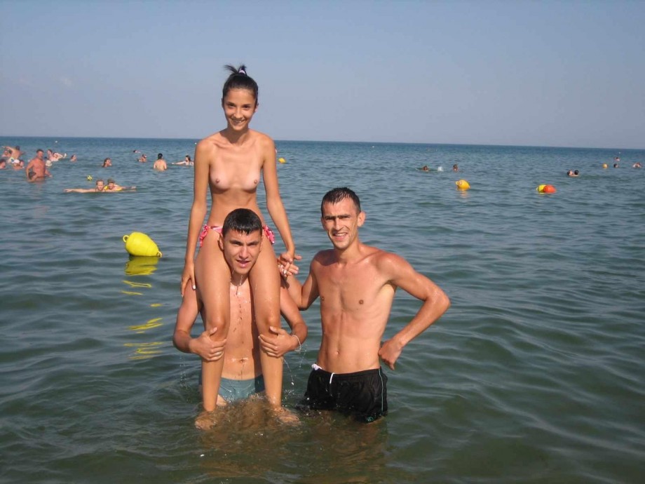 Young couples at holiday ( topless pics )