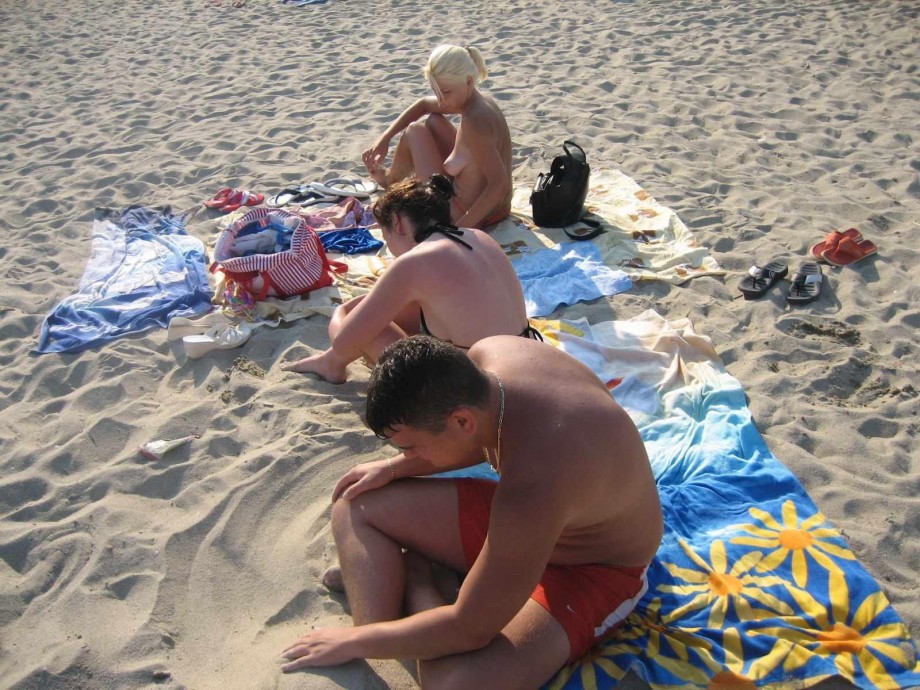 Young couples at holiday ( topless pics )