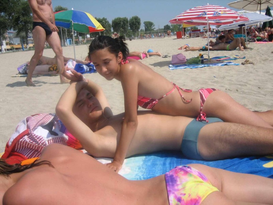 Young couples at holiday ( topless pics )