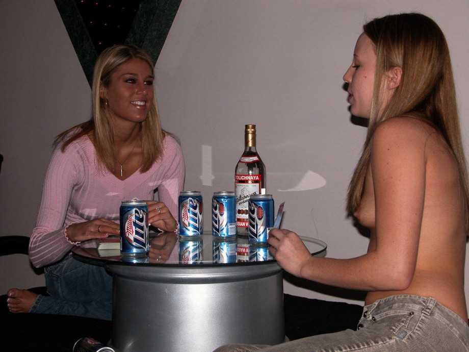 Two girls playing strip poker 