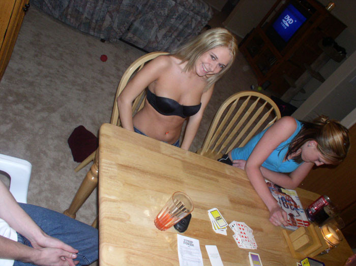Amateur teens playing strip poker party