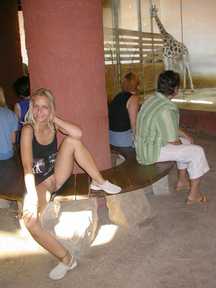 Young blonde girl and her exhibition  from the zoo