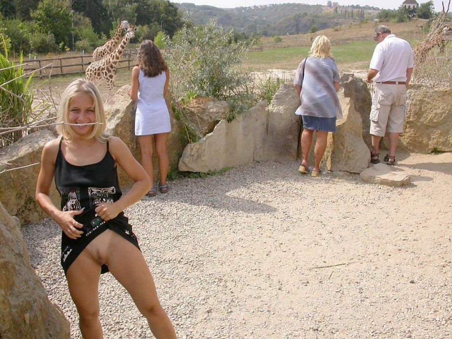 Young blonde girl and her exhibition  from the zoo